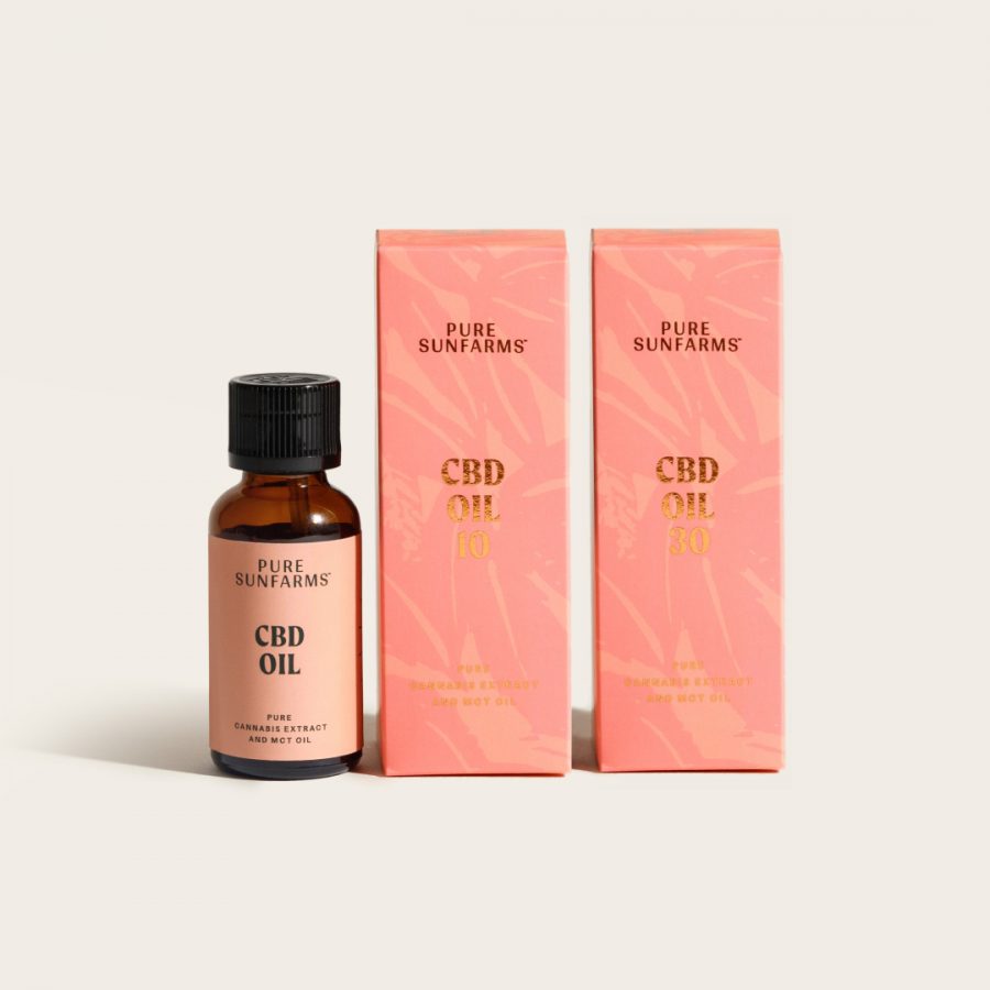 CBD Oil 30 and CBD Oil 10 boxes with an oil bottle on cream background
