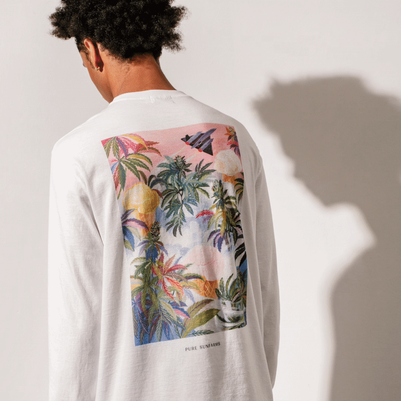 Model wearing Pure Sunfarms long sleeve shirts with strain artwork on back