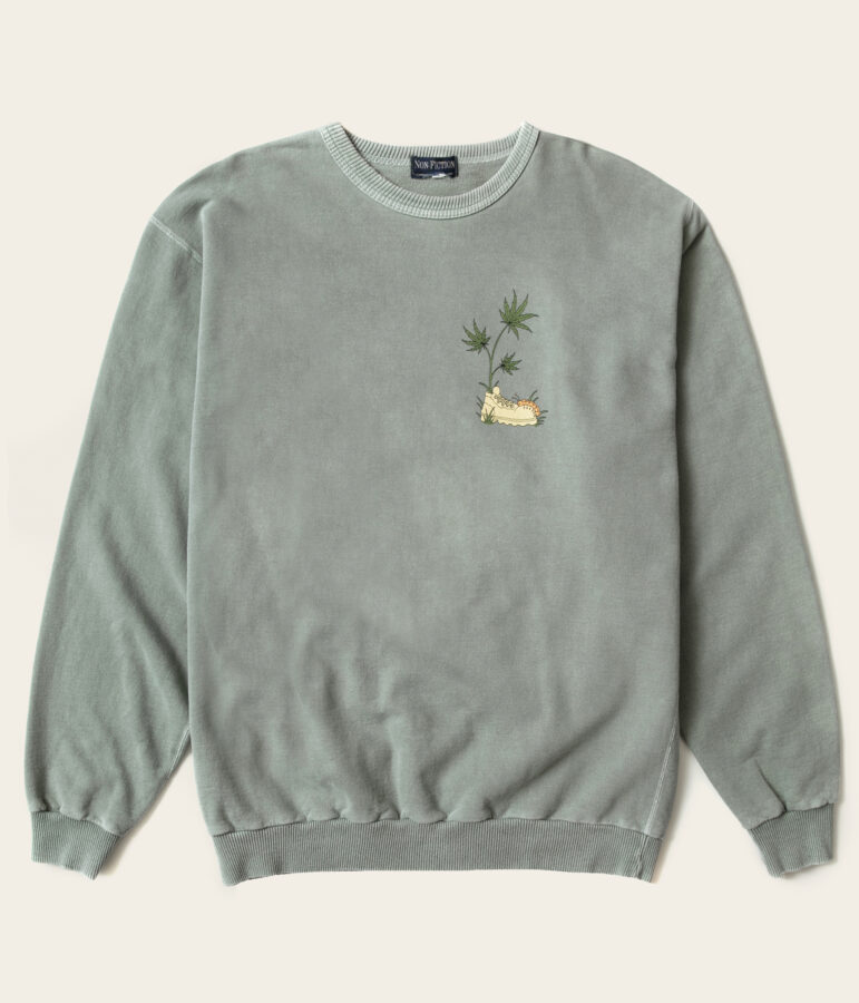 green crewneck with graphic