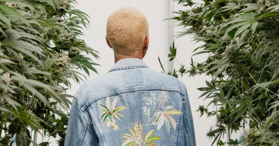 model wearing denim jacket with embroidery