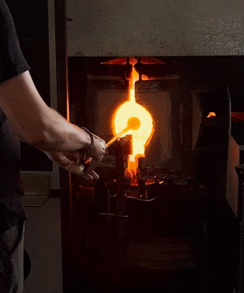 Glass Tray in fire being blown